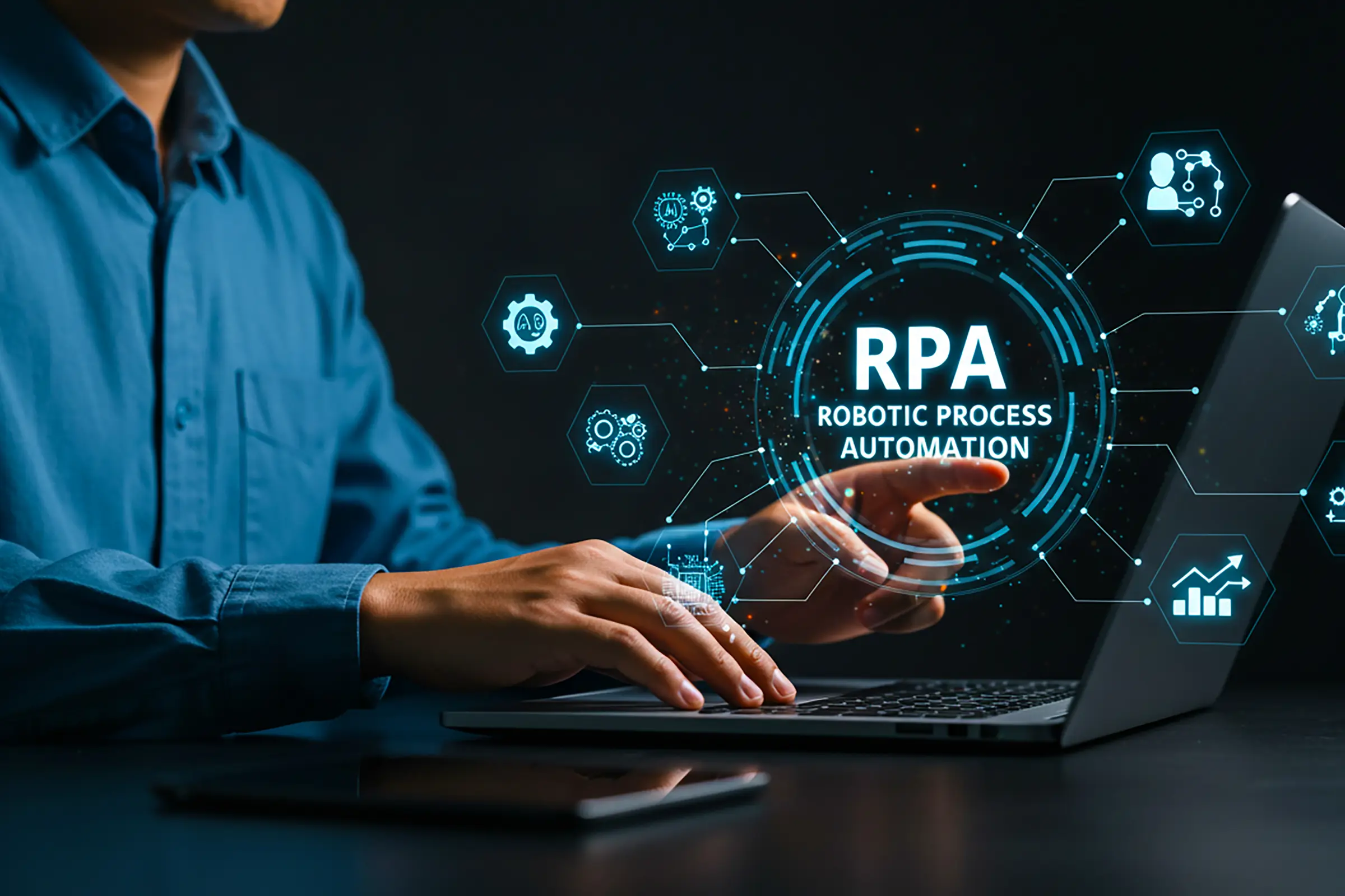 An operator running robotic process automation from a laptop